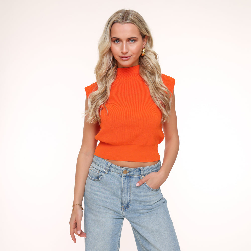  Analyzing image    KLEDING-ORANJE-GEBREIDE-SPENCER-TOP-LICHTBLAUWE-JEANS-SPIJKERBROEK