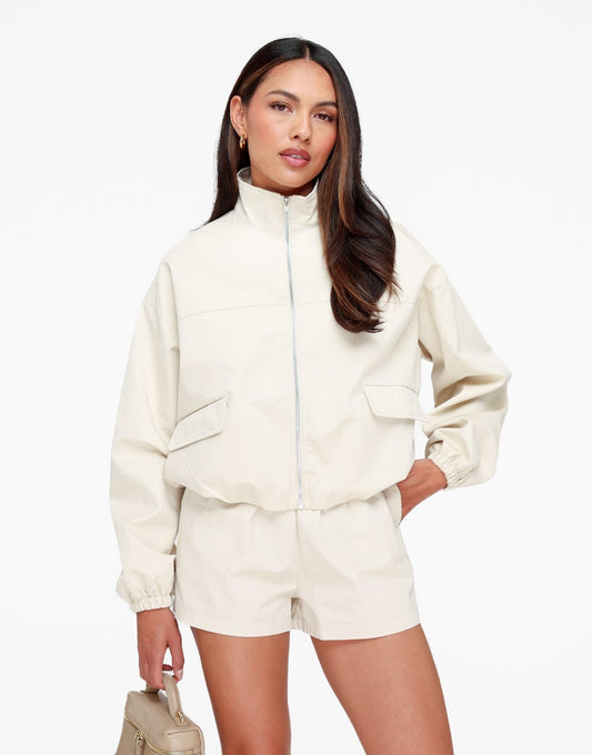 Beige Puffy Elastische Onderkant - Jas - Olivia & Kate