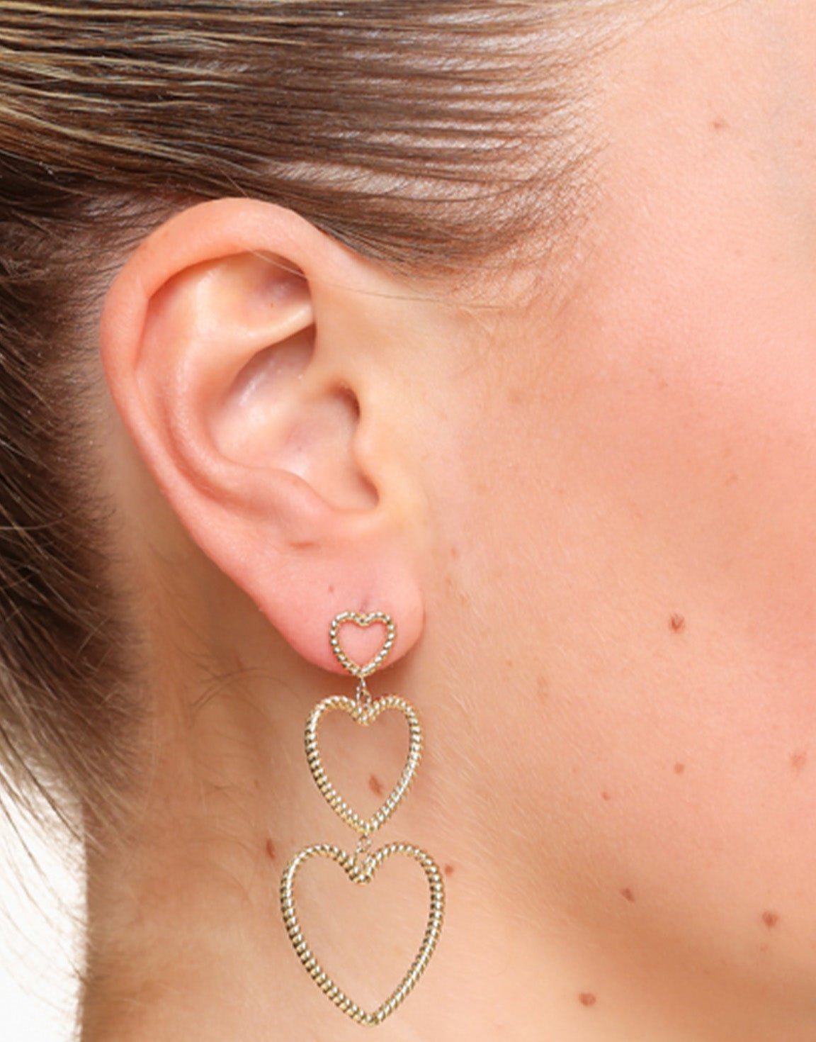 Gouden Gedetailleerde Open Rij Hartjes - Oorbellen - Olivia & Kate