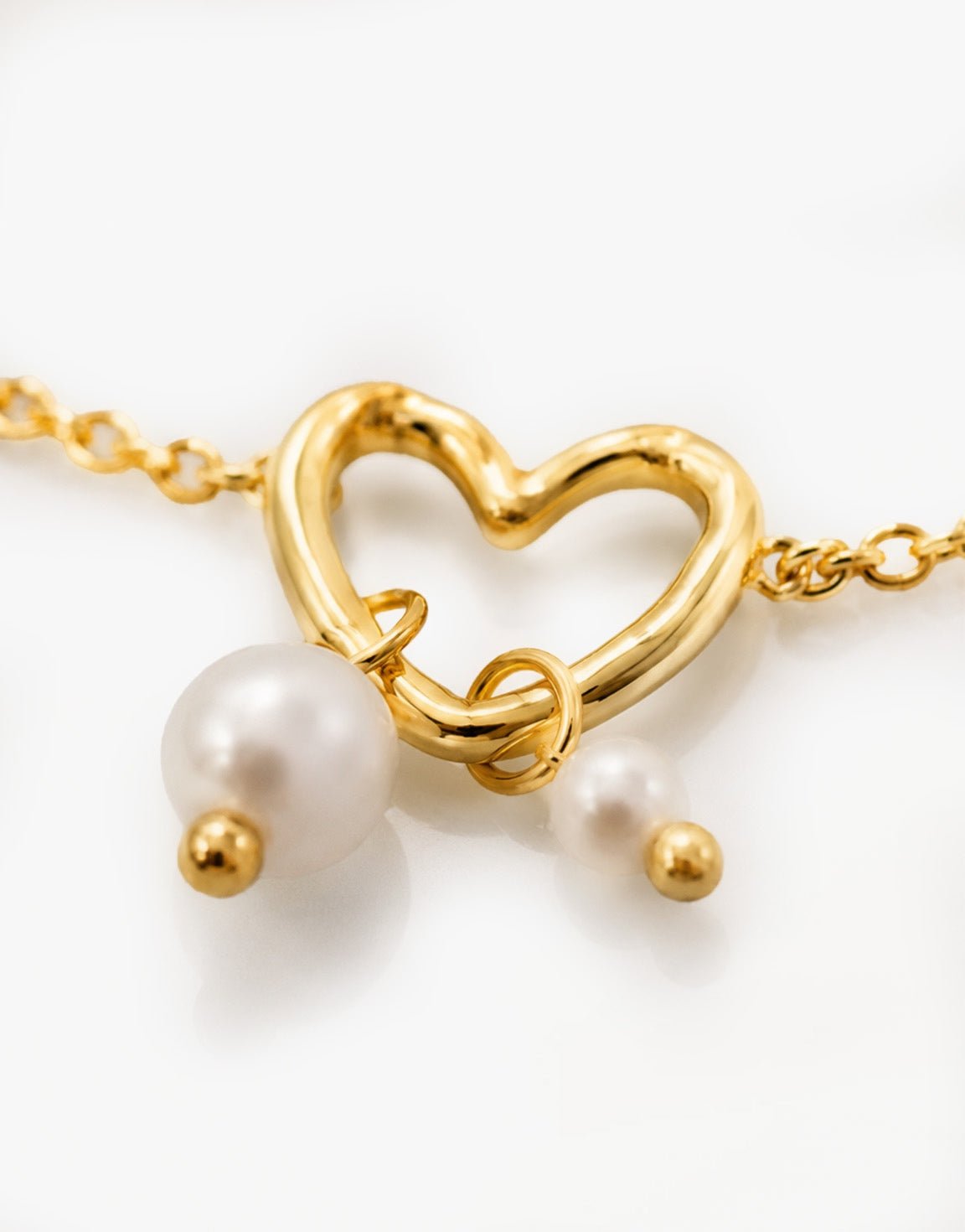 Gouden Open Hart Parel - Armband - Olivia & Kate
