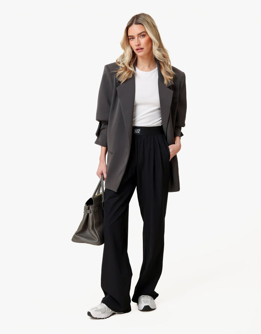 Zwarte O&K Elastische Wijde Pijpen - Broek - Olivia & Kate